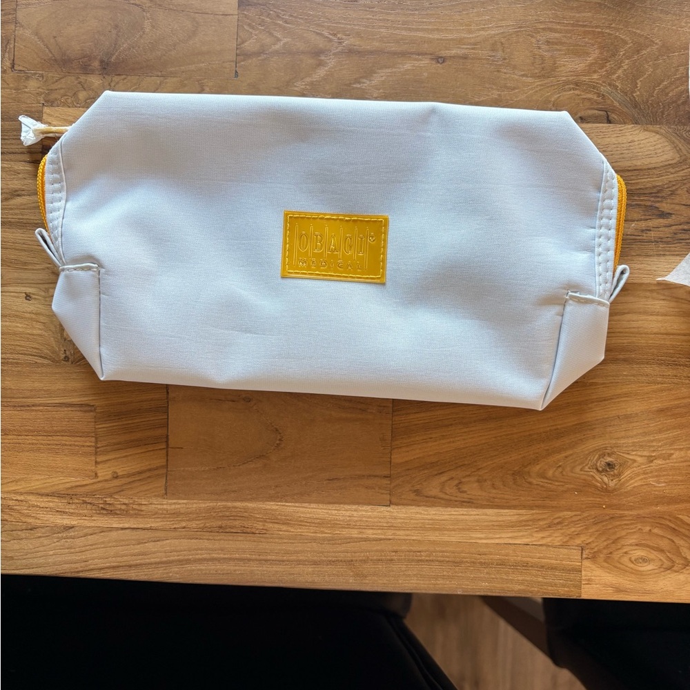 OBAGI White and Yellow brand new large cosmetic makeup toiletries travel bag